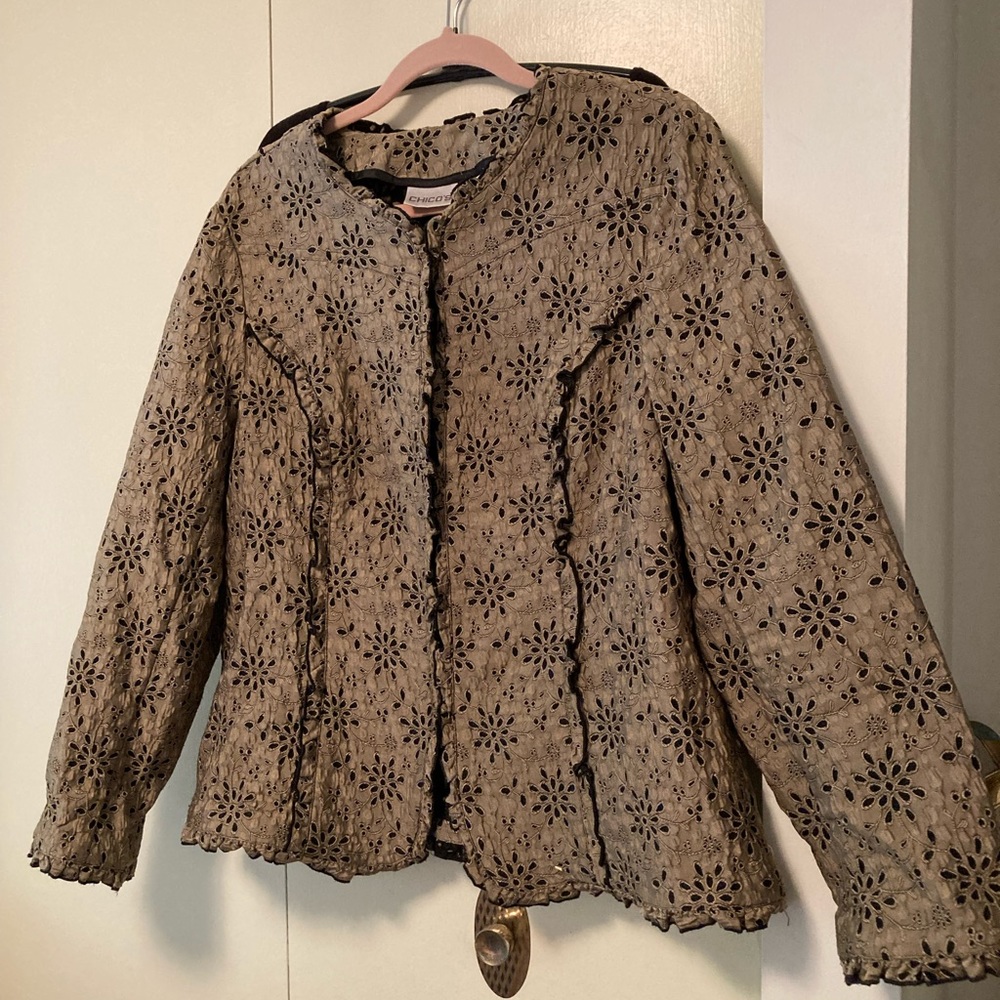 Eyelet jacket with ruffled trim along all openings